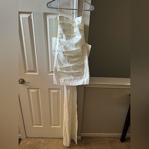 Small white mini dress with large bow train